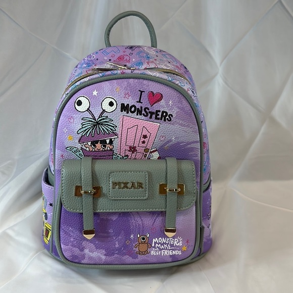 Wonda Pop Handbags - Wonda Pop Disney Pixar Monsters 11” mini backpack Peek-A-Boo Vegan Leather